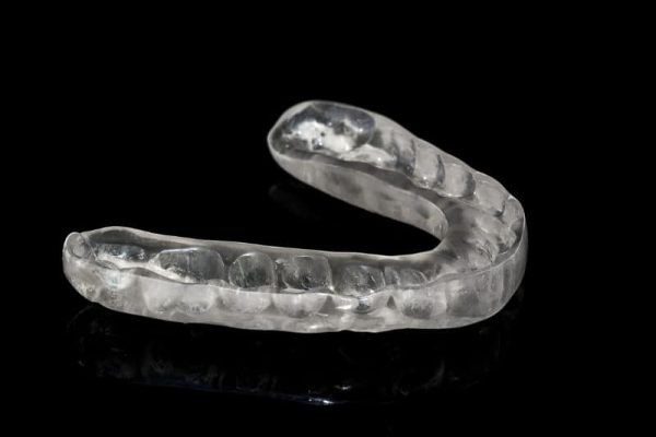 Semi-solid mouth guard/splint to prevent bruxism.